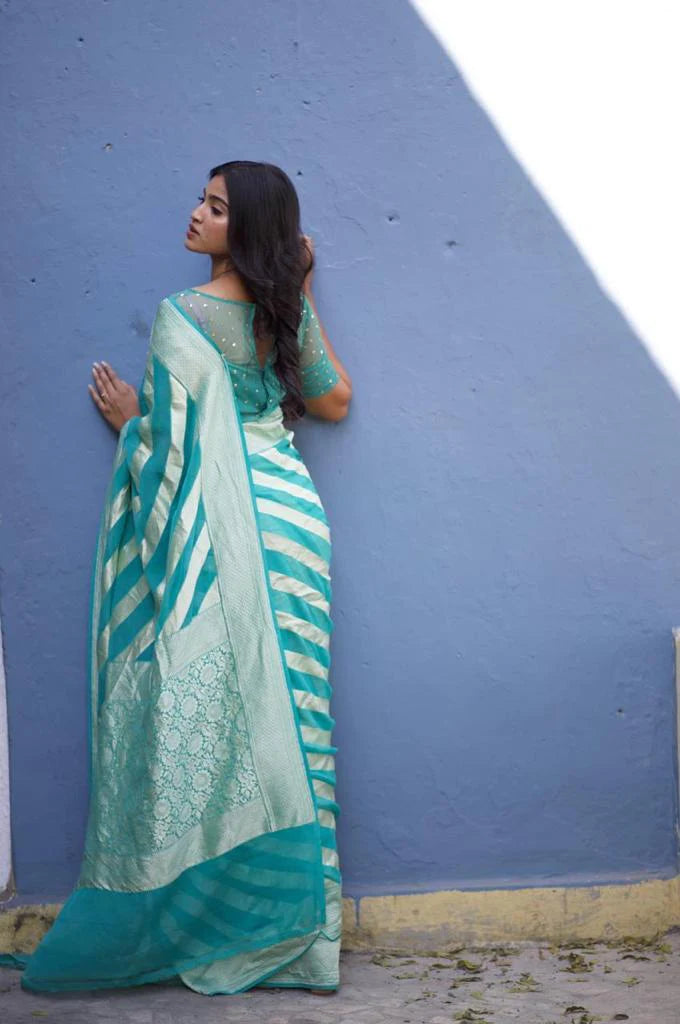 Kala Niketan Mesmeric Turquoise Soft Banarasi Silk Saree With Blissful Turquoise Blouse Piece