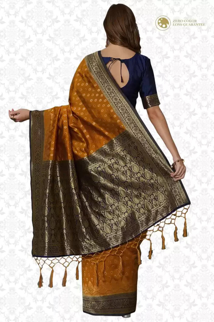 Kala Niketan Apricot Orange Silk Woven saree with contrast brocade Border