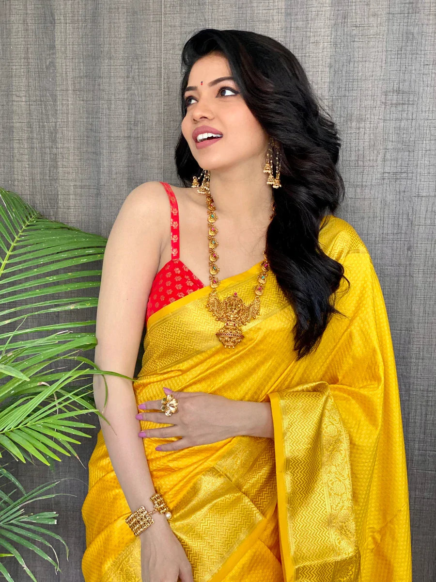 Kala Niketan Yellow Smooth Silk Saree With Golden Zari Border
