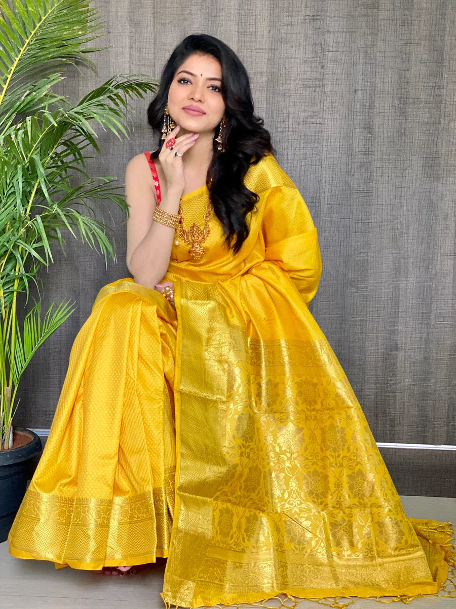 Kala Niketan Yellow Smooth Silk Saree With Golden Zari Border