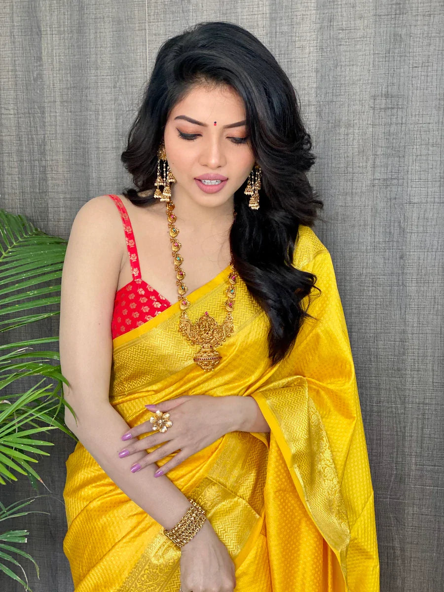 Kala Niketan Yellow Smooth Silk Saree With Golden Zari Border