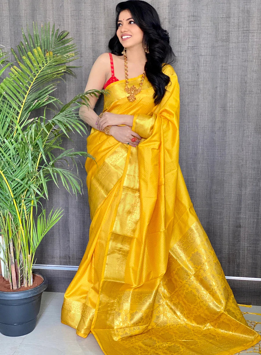 Kala Niketan Yellow Smooth Silk Saree With Golden Zari Border